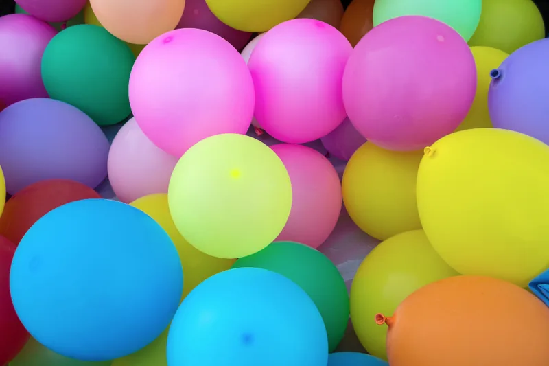 A bright heap of party balloons